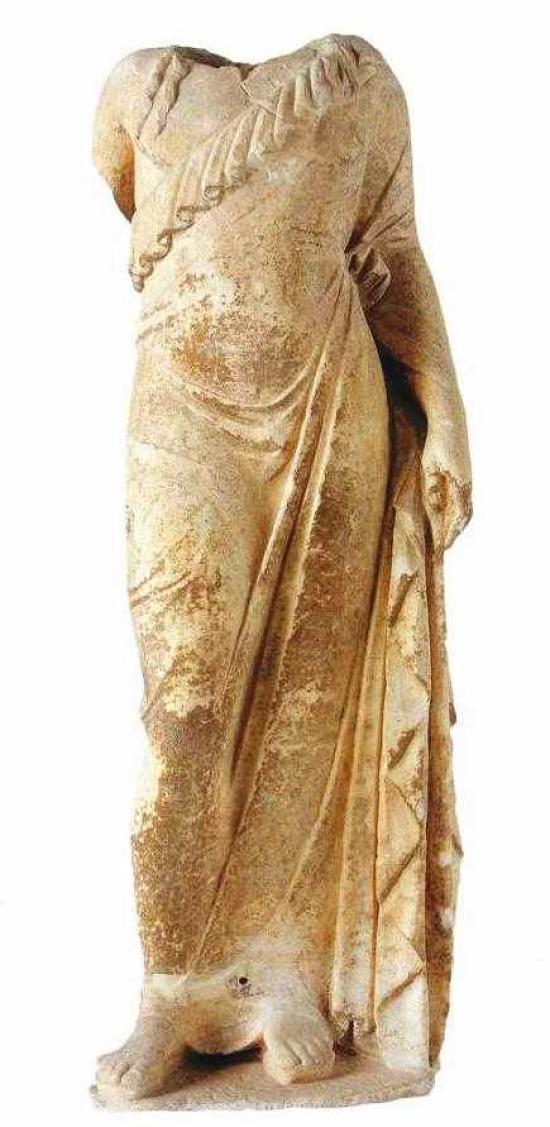 ARCHAISTIC STATUE OF DIONYSUS (POSSIBLY)